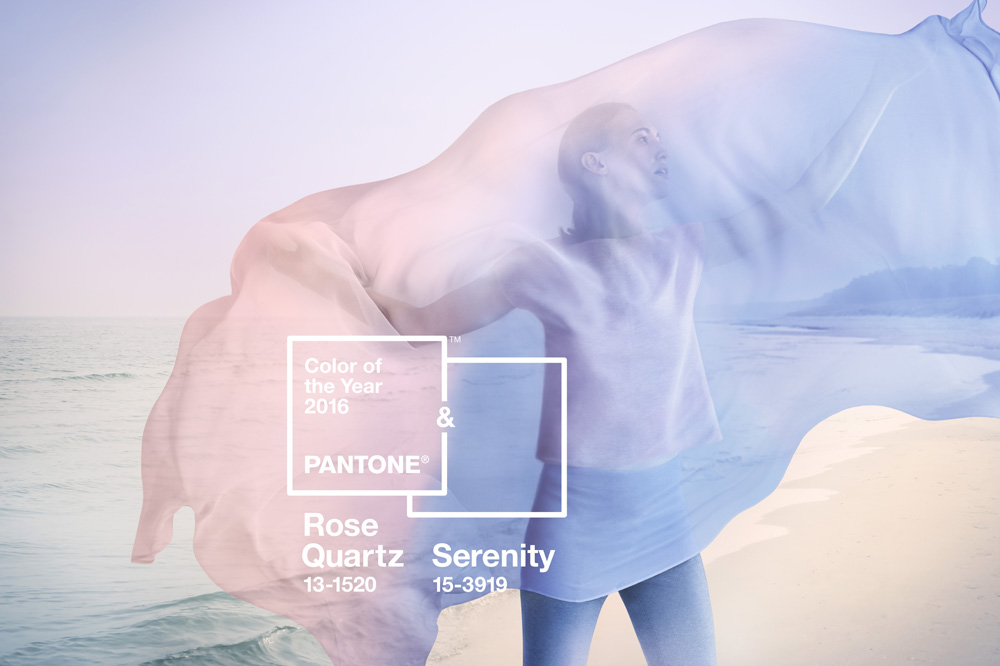 person on the beach with transparent pink and blue fabric