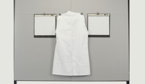 Lab coat hanging on viewing board