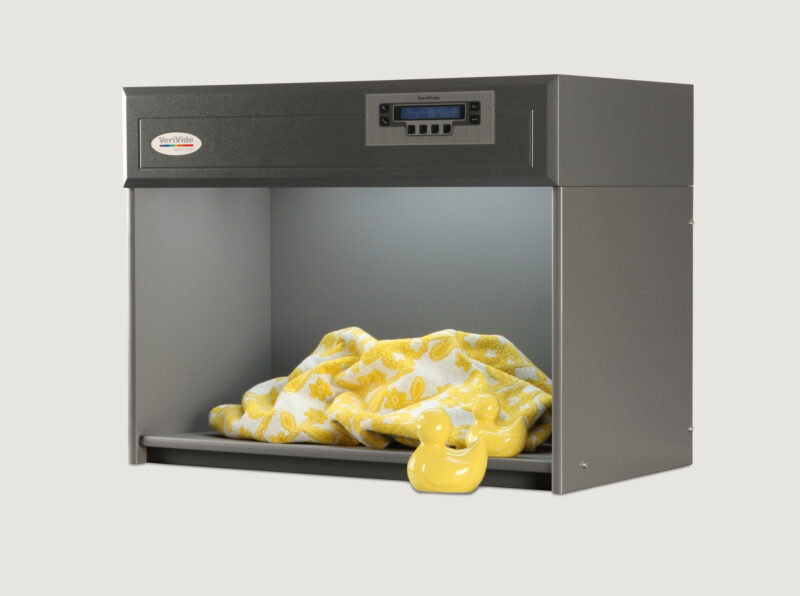 Yellow duck and towel in colour assessment cabinet