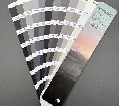selection of grey, black and beige colours on Pantone fan