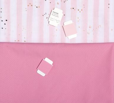 Pink fabrics with Pantone chip set chips