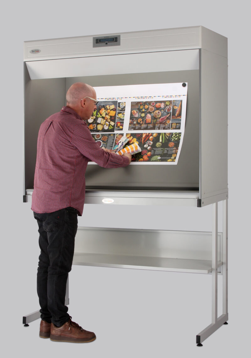 Colour Control Cabinet with person checking print colour