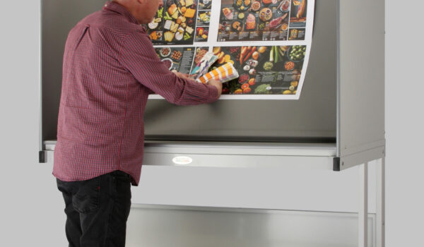 Colour Control Cabinet with person checking print colour