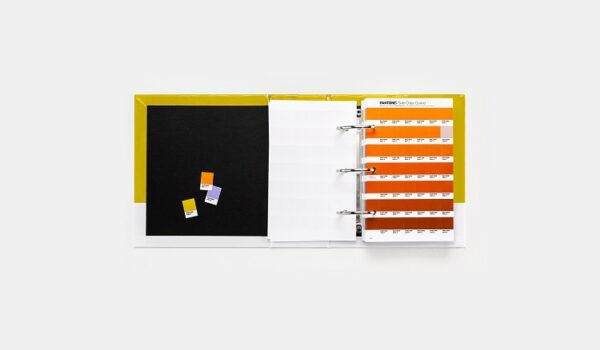 Pantone GP1606C Solid Chips book open to show page of colour chips