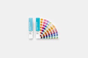 Pantone GP6102C Color Bridge fans, one open to show colour range